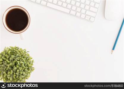 Flat lay photo of office desk with mouse and keyboard,Copy space on white background with coffee,Top view