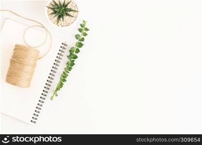 Flat lay photo sack rope on notepad on white background, white copy space for you product