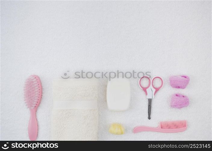 flat lay pink bath accessories baby