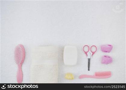 flat lay pink bath accessories baby