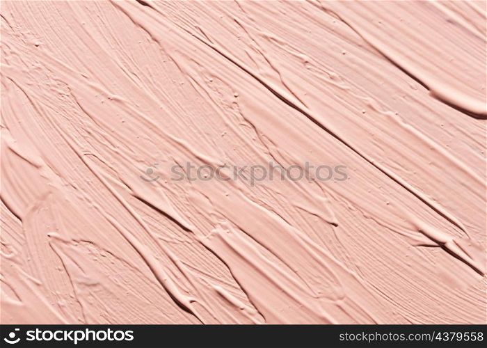 flat lay pink paint brush strokes surface