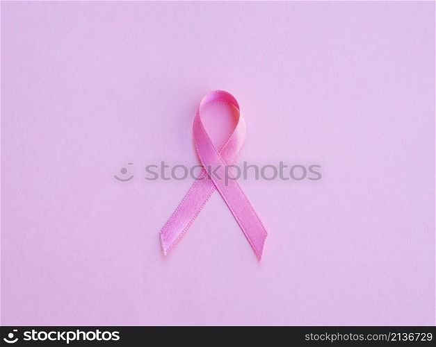 flat lay pink ribbon background