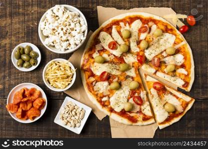 flat lay pizza wood table