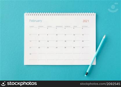 flat lay planner calendar blue background