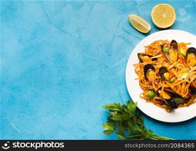 flat lay plate mussels pasta with copyspace