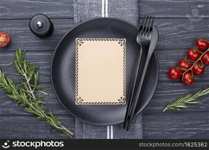 flat lay plate with cutlery tomatoes