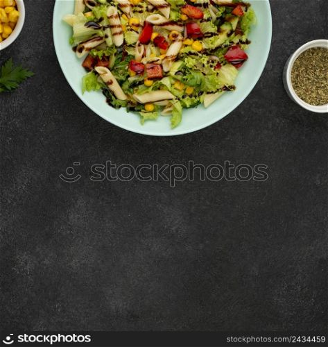flat lay salad with chicken balsamic vinegar with copy space