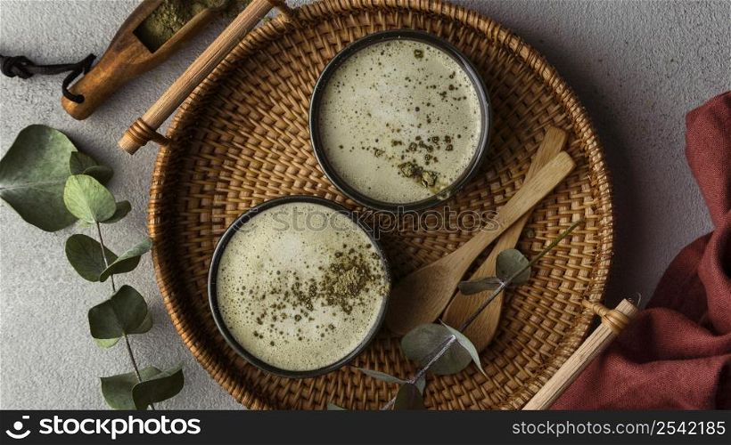 flat lay tea cups herbs