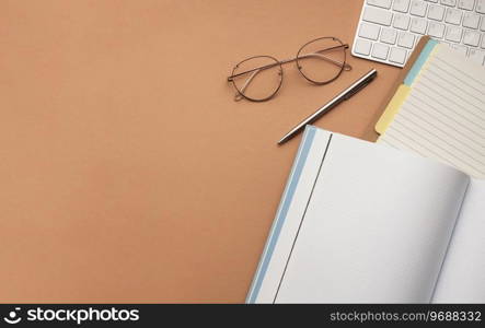 Flat lay, top view office table desk. Workspace with blank clip board, keyboard, office supplies, pencils and pens