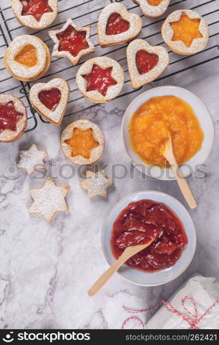 Flat lay with christmas cookies on marble surface