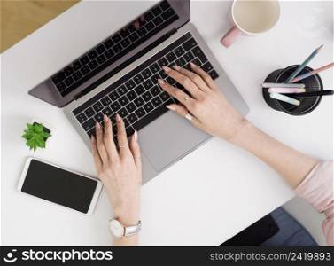 flat lay woman working laptop