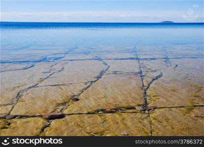 Flat rock coast with transparent water. From the swedish island oland.
