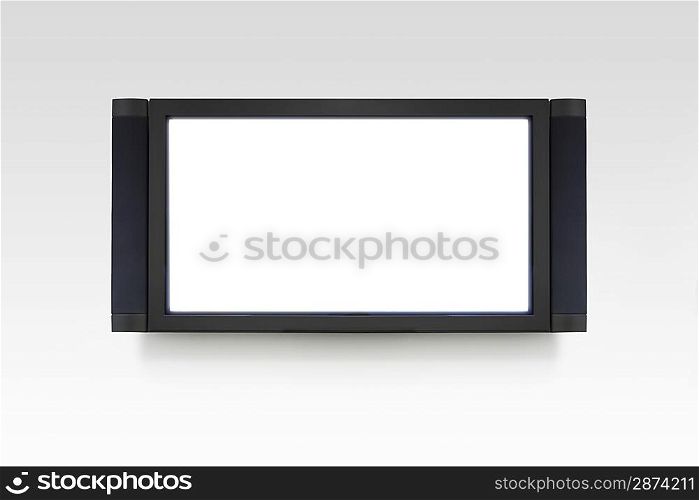 Flat screen television on white wall