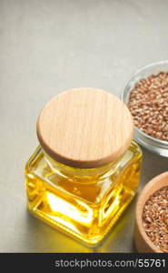 flax seeds in bowl on table background