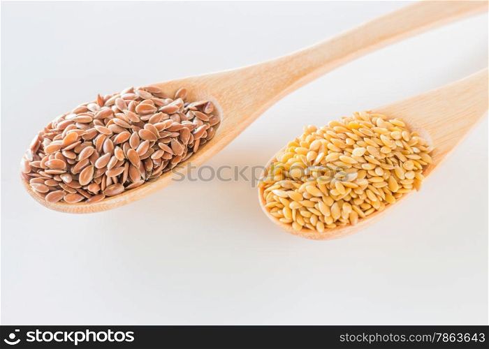 Flax seeds on wooden spoon, stock photo