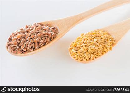 Flax seeds on wooden spoon, stock photo