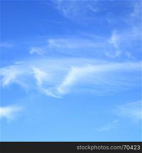 Fleecy clouds in blue sky, may be used as abstract background