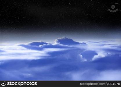 Flight over clouds. Wonderful panorama from window of plane with white clouds. Flying over white clouds. White cloud below. Beautiful panorama with heaven. Wonderful panorama from window of plane with white clouds
