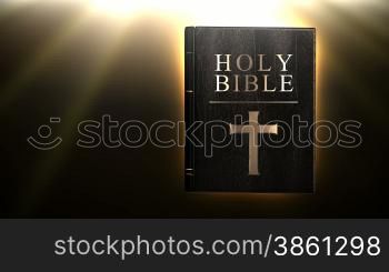 Flipping bible pages in blank A4 concept with glowing background