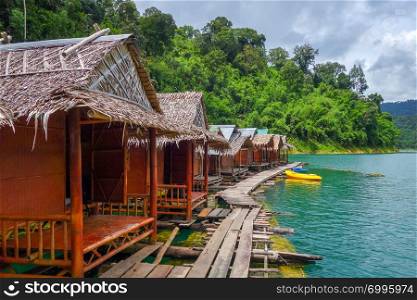 Floating bungalows village in Cheow Lan Lake, Khao Sok, Thailand. Floating village in Cheow Lan Lake, Khao Sok, Thailand