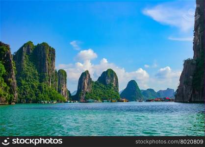 Floating fishing village near rock islands in Halong Bay, Vietnam, Southeast Asia