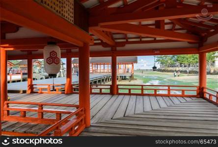 Floating Shrine?s hall and pathway of Itsukushima Shrine at low tide in Miyajima island, Japan