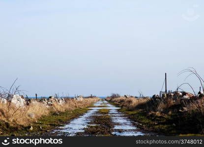 Flooded dirt road at the swedish island Oland