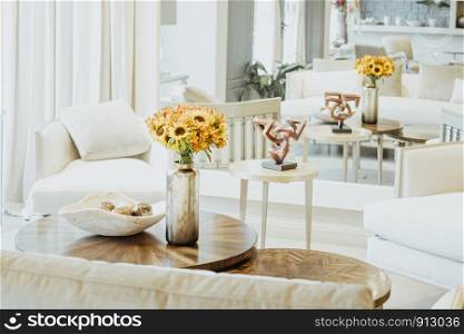 Floral arrangement of sunflowers decorating the living room of the house