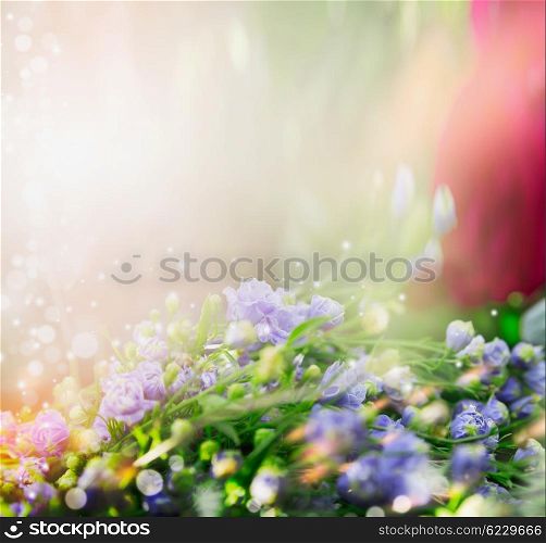 Floral nature background with little blue flowers. Romantic flowers border.