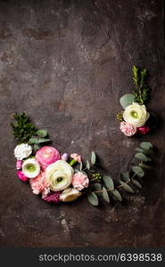 Floral round frame with eucalyptus branches and leaves, flat lay flowers, top view with copy space. Floral round frame