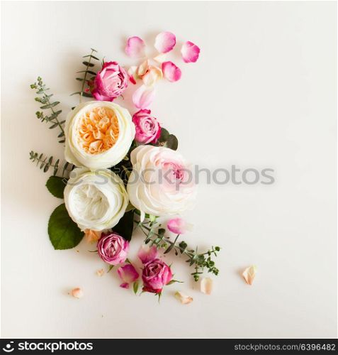 Floral round wedding frame flat lay. Rose flowers top view with copy space. Floral wedding frame