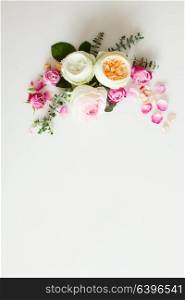 Floral round wedding frame flat lay. Rose flowers top view with copy space. Floral wedding frame