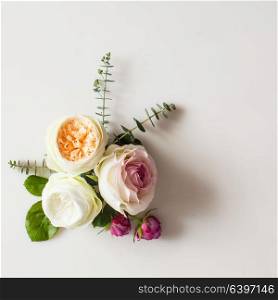 Floral wedding frame. Floral round wedding frame flat lay. Rose flowers top view with copy space