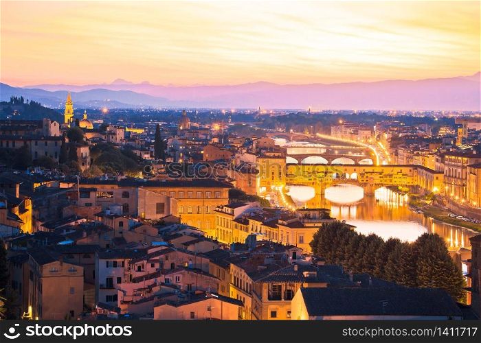 Florence cityscape and Arno river bridges sunset view, Ponte Vecchio, Tuscany region of Italy