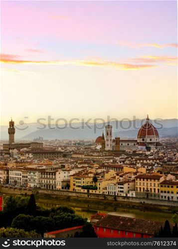 Florence cityscape and skyline panorama during summer sunset. Panoramic view of rooftops, Firenze, Tuscany, Italy. Florence panoramic skyline at sunset