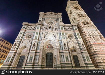 Florence, Italy - Circa August 2021: Florence by night. The illuminated architecture of the famous cathedral exterior.