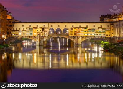 Florence. Ponte Vecchio.. The old medieval bridge Ponte Vecchio at sunset. Florence. Italy.