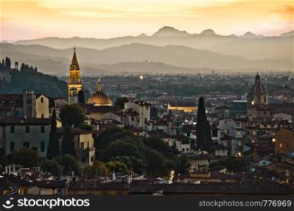 Florence towers and rooftops view at spectacular sunset, famous tourist destination in Tuscany region od Italy