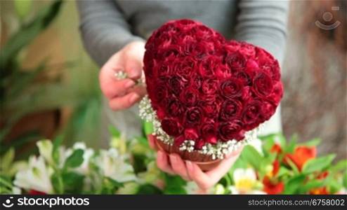 Florist Arranging Valentines Day Rose Heart Bouquet Closeup
