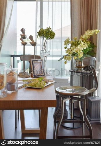 florist at home. flowers and accessories on wooden table