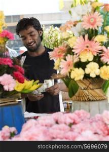 Florist counting his money