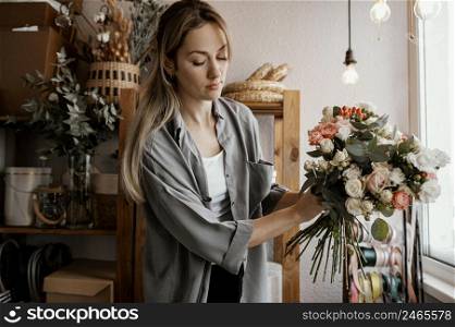 florist making beautiful floral arrangement 2