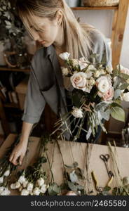 florist making beautiful floral arrangement 4