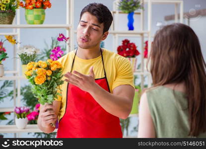 Florist selling flowers in a flower shop