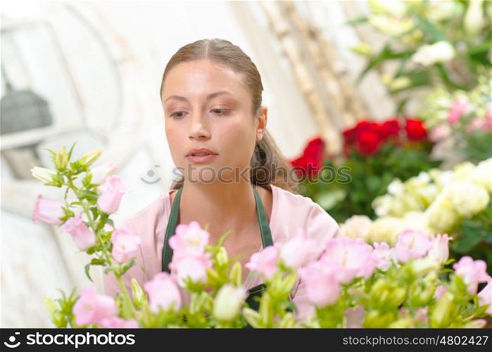 Florist stood amongst her flowers