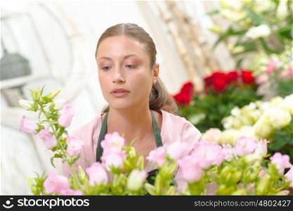Florist stood amongst her flowers