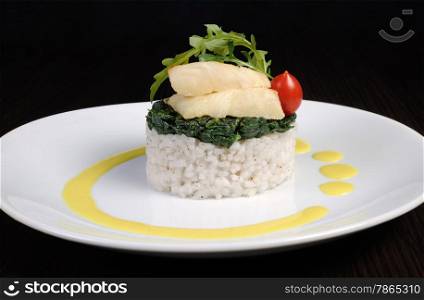 Flounder fillets (steamed) with risotto and spinach