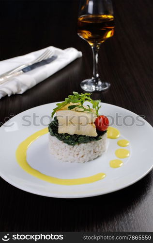 Flounder fillets (steamed) with risotto and spinach