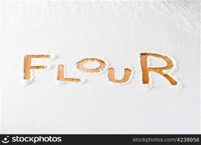 "Flour background with "flour" word"