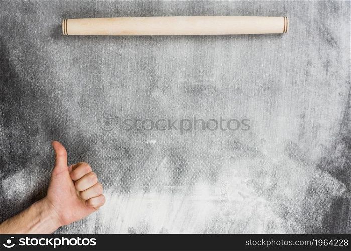 flour background with rolling pin hands making ok sign. High resolution photo. flour background with rolling pin hands making ok sign. High quality photo